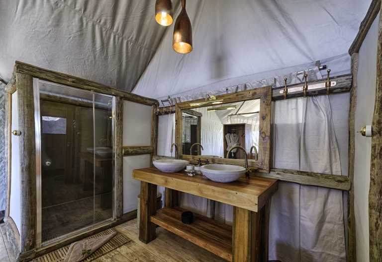 Tubu Tree Camp,Badezimmer, Familienzelt © Foto: Dana Allen | Wilderness Safaris