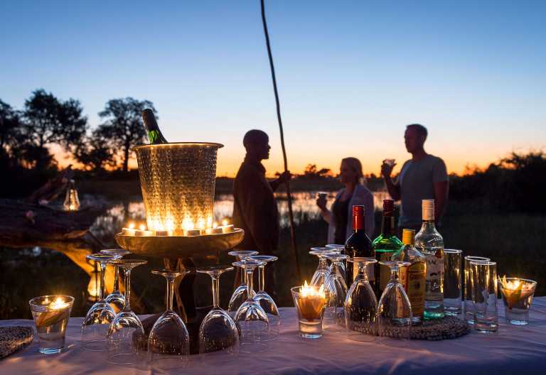 Jacana Camp, Sundowner-Drinks © Foto: Dana Allen | Wilderness Safaris