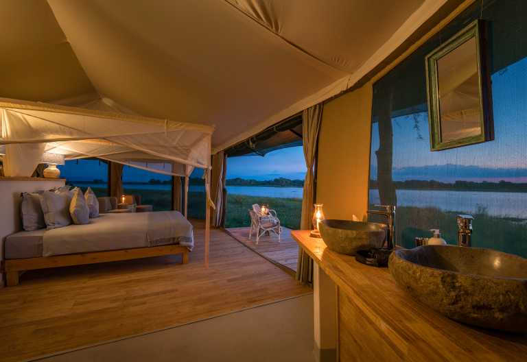 Kuthengo Camp - Zeltchalet am Abend © Foto: Dana Allen | Robin Pope Safaris