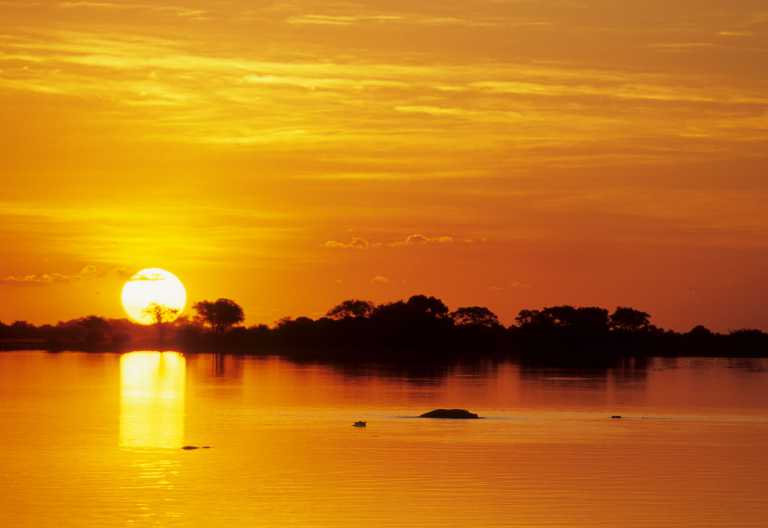 Sonnenuntergang über dem Chobe © Foto: Marco Penzel | Outback Africa
